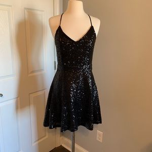 Black sequin skater dress